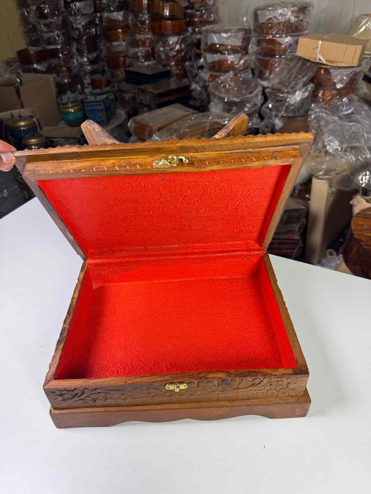 Hand-carved wooden Quran box with Islamic calligraphy and floral motifs